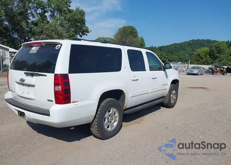 2010 Chevrolet Suburban 1500 Lt1 из США, поврежденный, VIN 1GNUKJE36AR223491